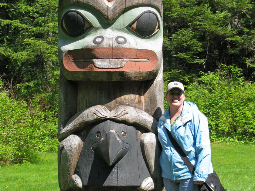 Becky at Totem Pole in Sitka National Historical Park - Alaska, June 2009